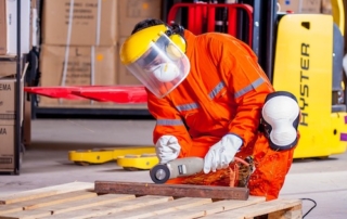 GrowEQ Person in safety gear working on floor